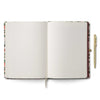 Open notebook with lined pages and a pen on a white background