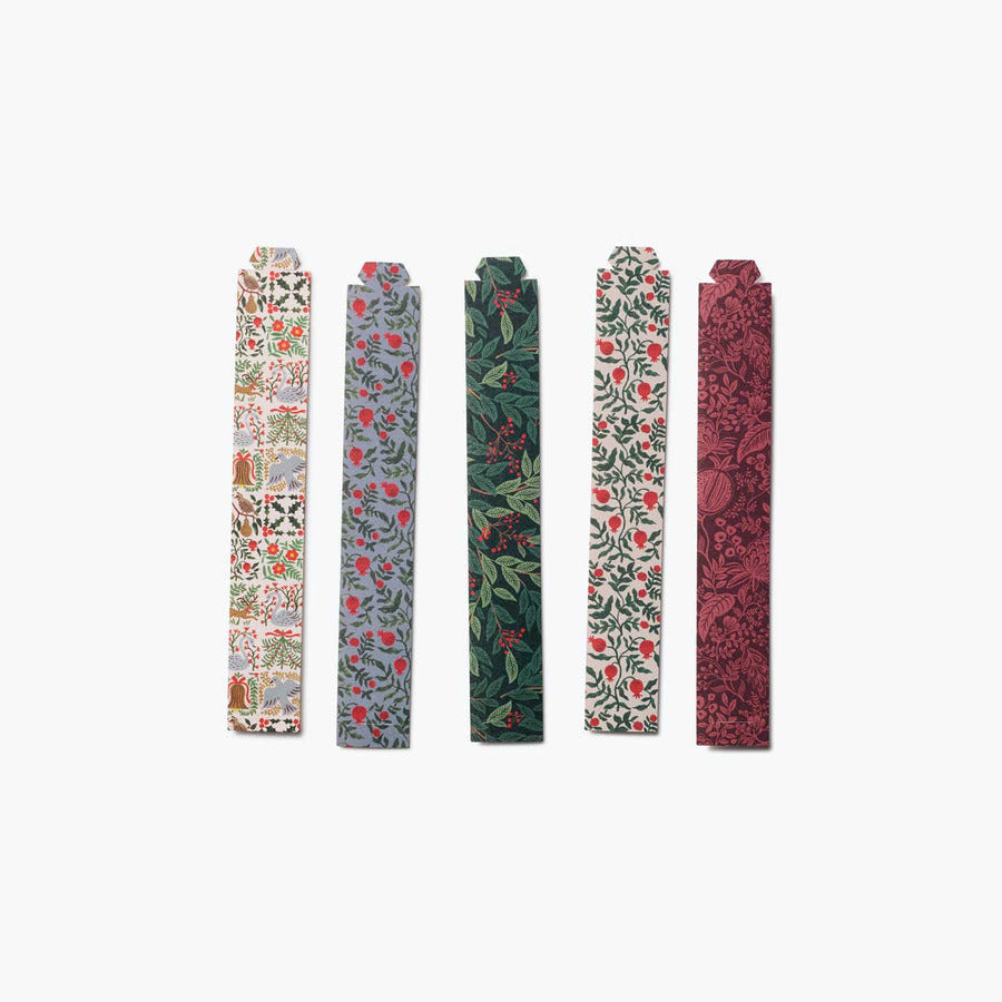 Five floral-patterned hair clips on a white background