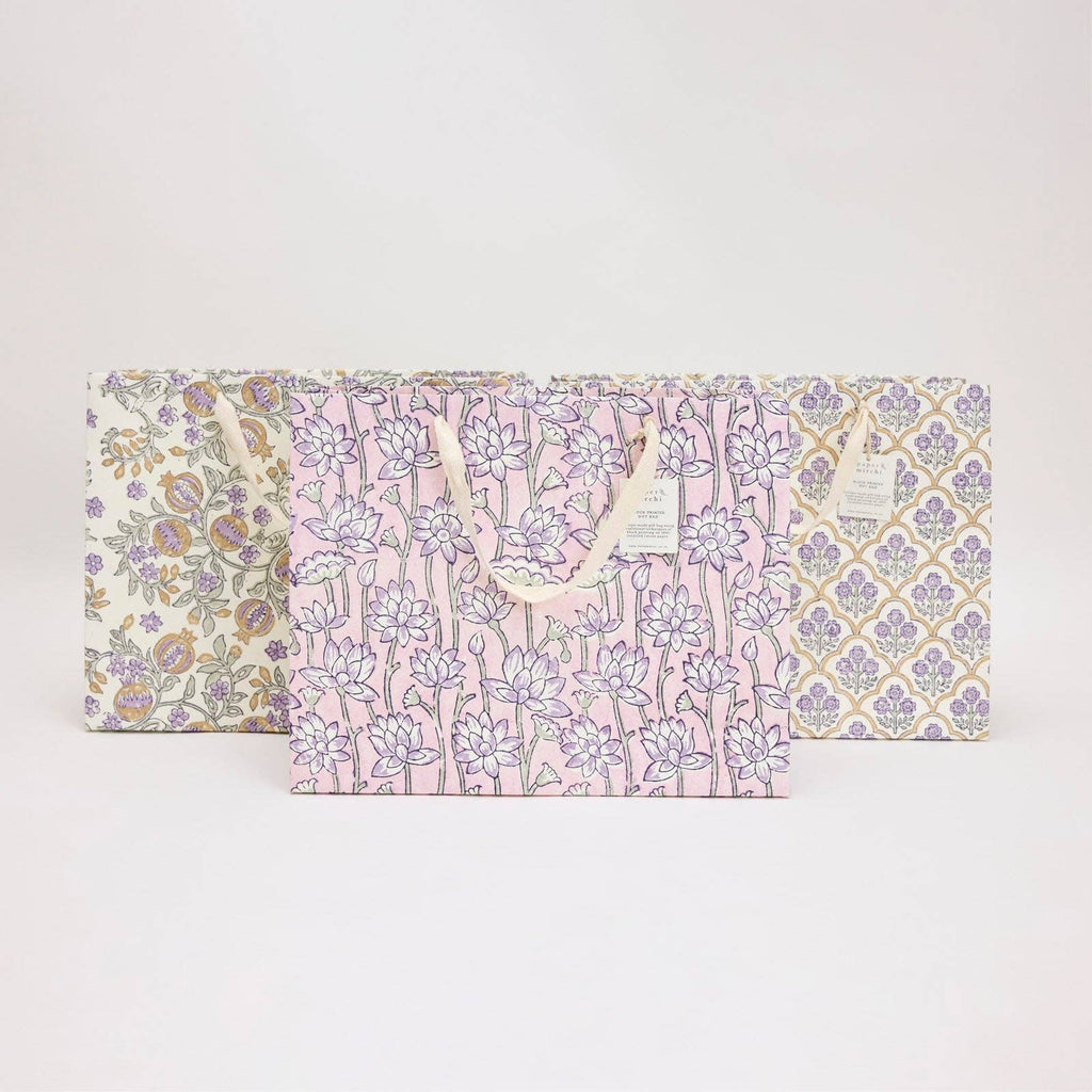 Floral-patterned gift bag on a white background