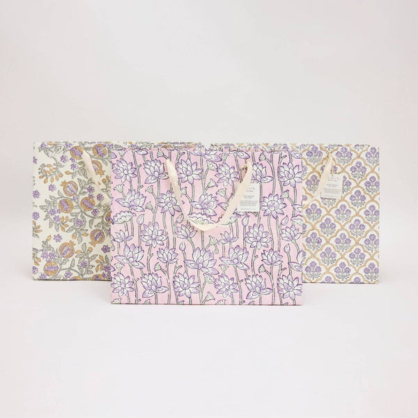 Floral-patterned gift bag on a white background