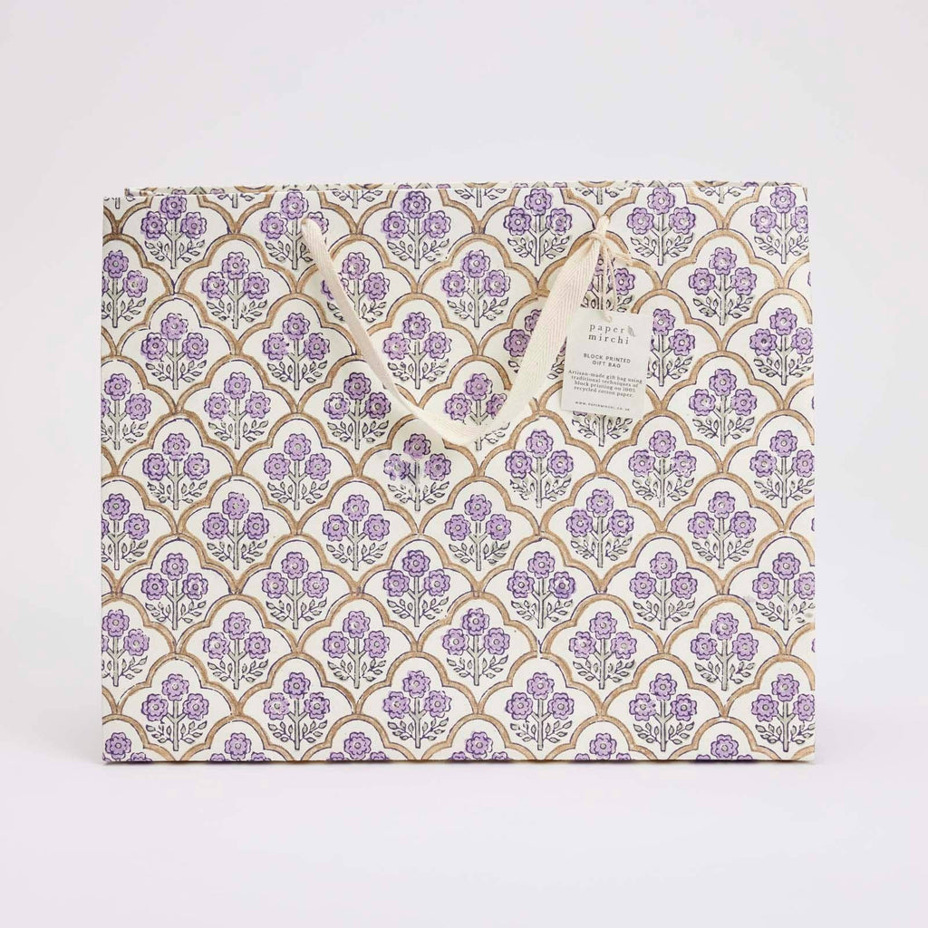 Product packaging with a floral pattern on a white background
