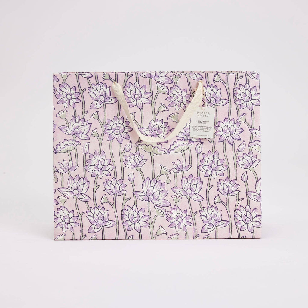 Floral-patterned gift bag on a white background