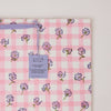 Pink checkered fabric with floral patterns and a 'paper mirchi' tag.