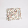 Floral-patterned bag on a white background