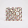 Product packaging with floral pattern on a white background