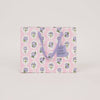 Floral-patterned tote bag with a visible brand label on a light gray background