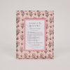 Floral patterned picture frame with 'paper mirchi' branding on a light pink background