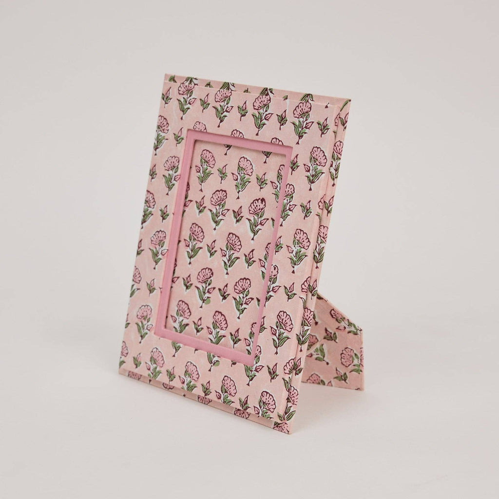 Floral patterned fabric on a light pink background