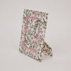 Floral-patterned product on a light gray background