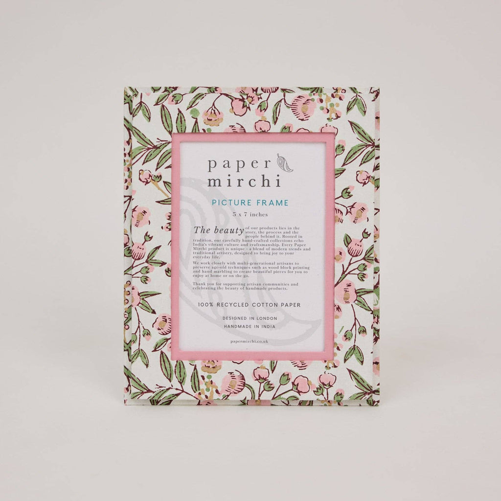 Floral-patterned picture frame with 'paper mirchi' branding on a white background