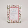 Floral-patterned picture frame with 'paper mirchi' branding on a white background
