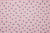 Pink checkered fabric with small floral patterns