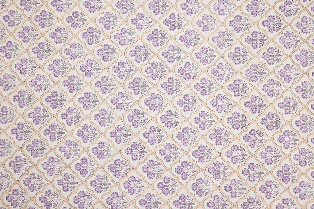 Patterned fabric with purple and beige design