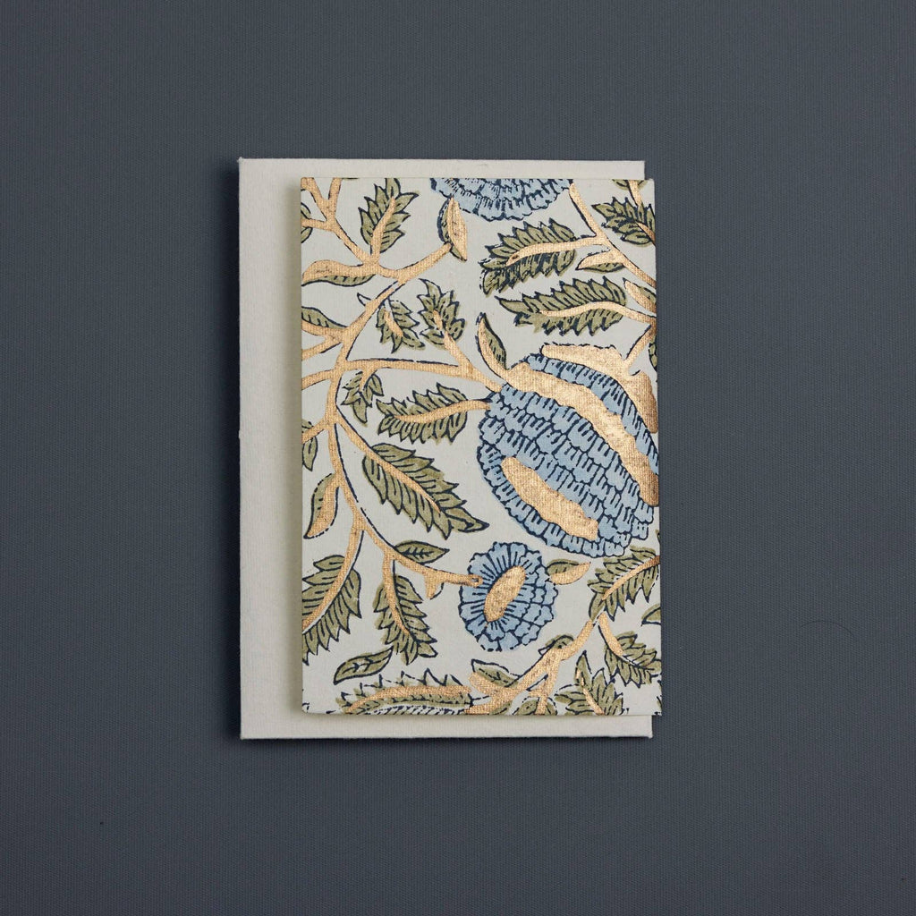 Floral patterned card on a dark gray background
