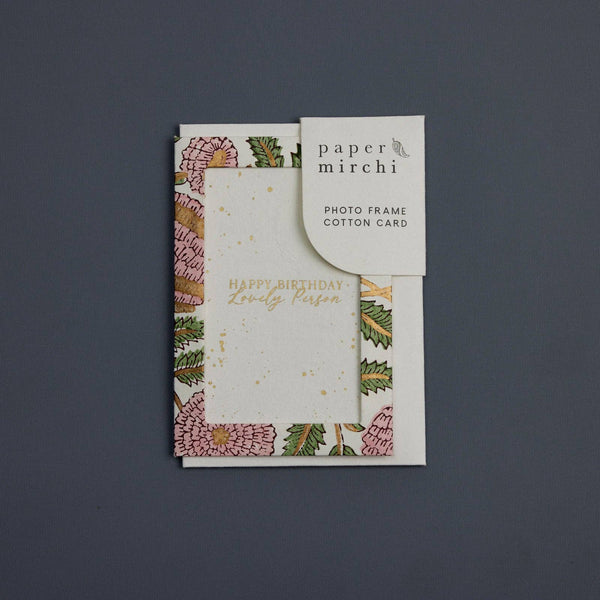 Floral photo frame cotton card with 'paper mirchi' branding on a dark background