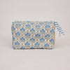 Fabric pouch with blue floral pattern on a light gray background