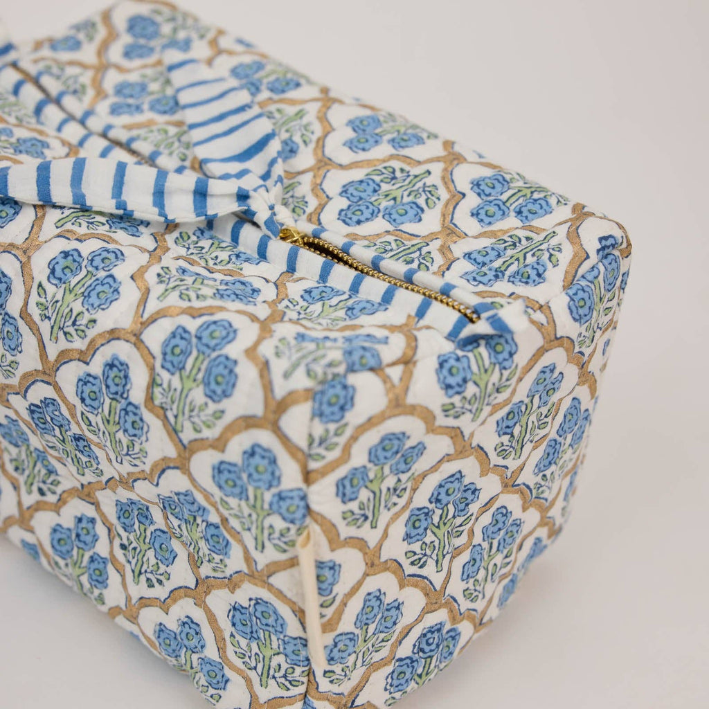 Tissue box cover with floral pattern and blue stripes on a white background