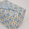Tissue box cover with floral pattern and blue stripes on a white background