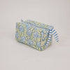 Fabric pouch with blue floral pattern on a light gray background