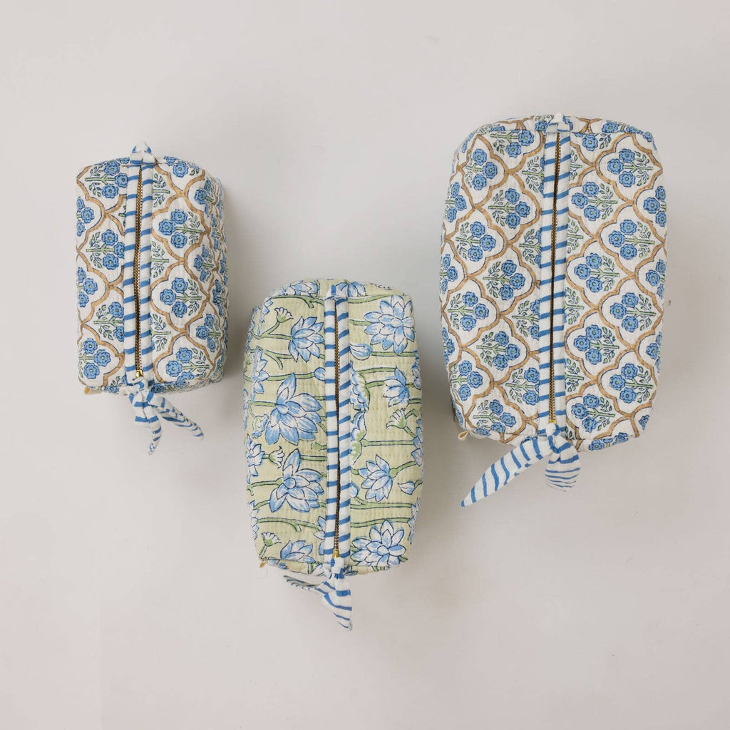 Three patterned fabric wraps on a light gray background