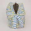 Fabric pouch with floral pattern and striped tie on a white background