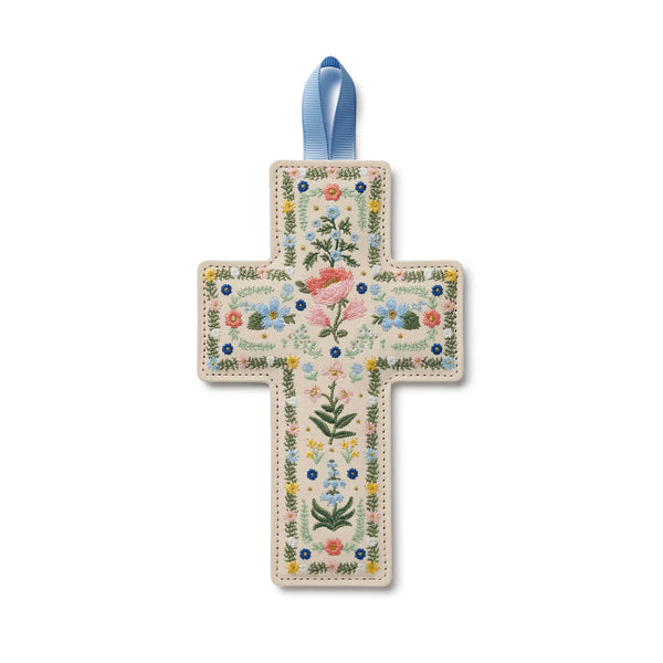 Decorative cross with floral patterns on a white background