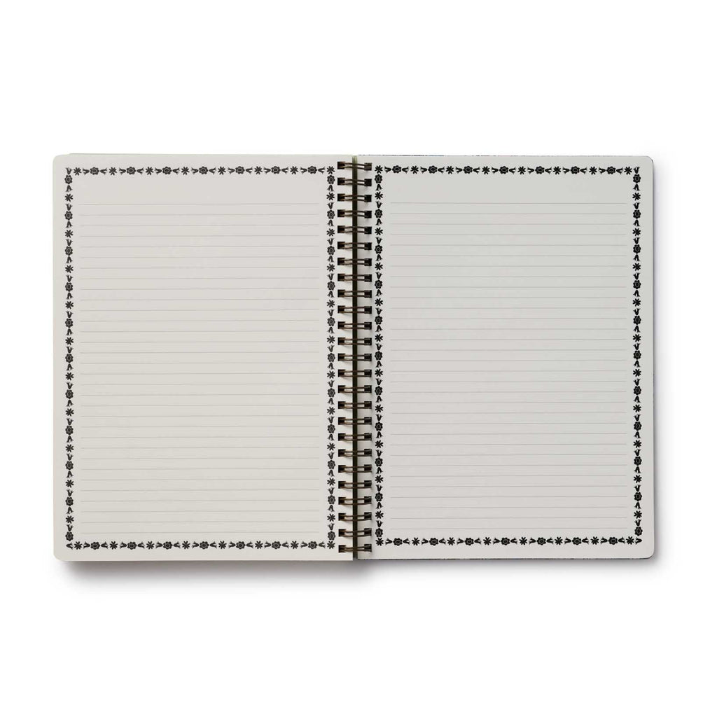 Open notebook with lined pages on a white background