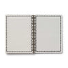 Open notebook with lined pages on a white background