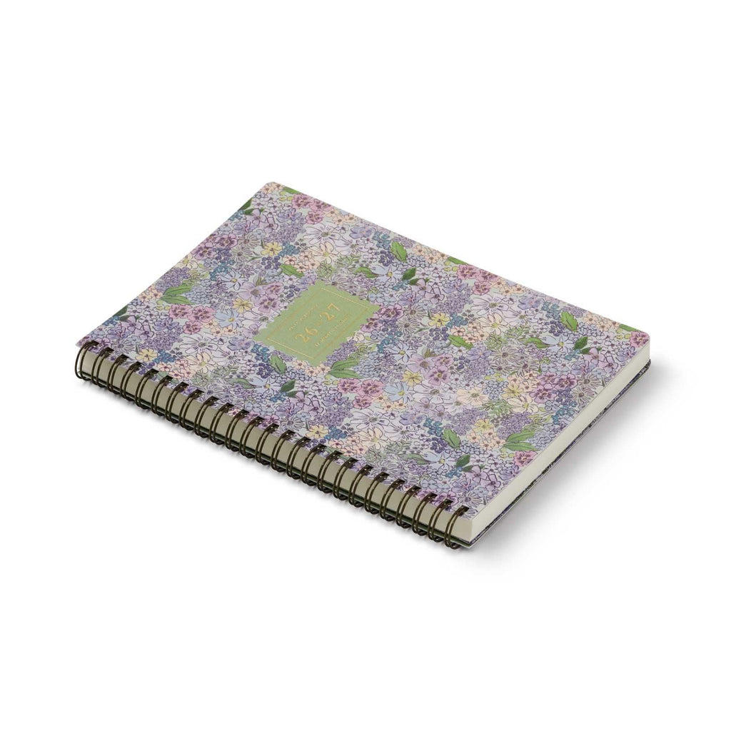 Floral patterned notebook on a white background
