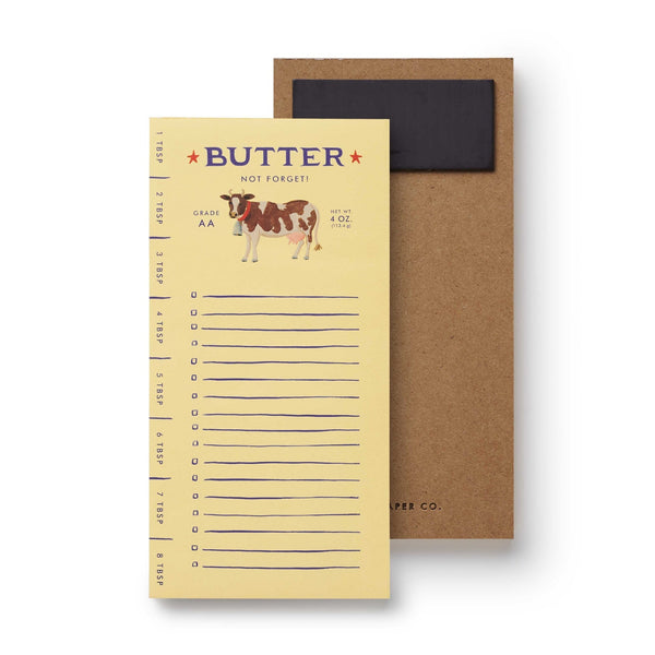 Butter notepad with a cow illustration and measurement scale, housed in a brown cardboard sleeve.