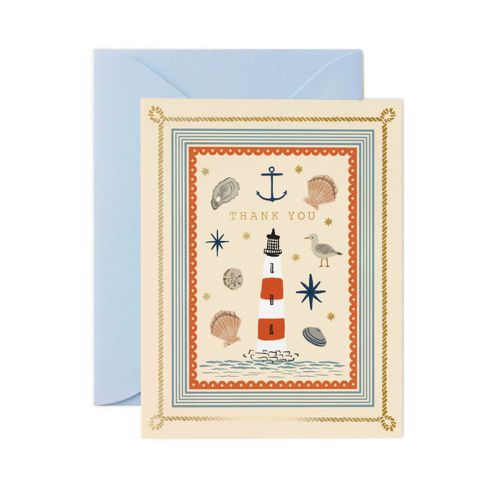 Greeting card with nautical design and 'Thank you' text, featuring a blue envelope.