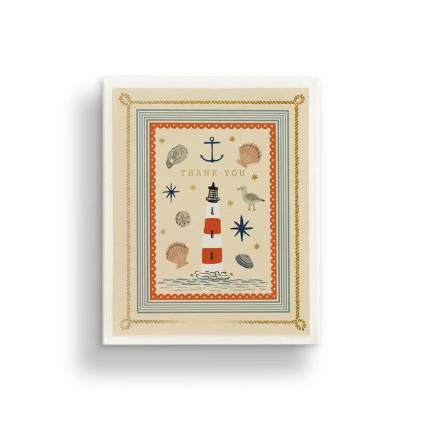 Framed artwork with nautical-themed illustrations and 'Thank You' text on a beige background.