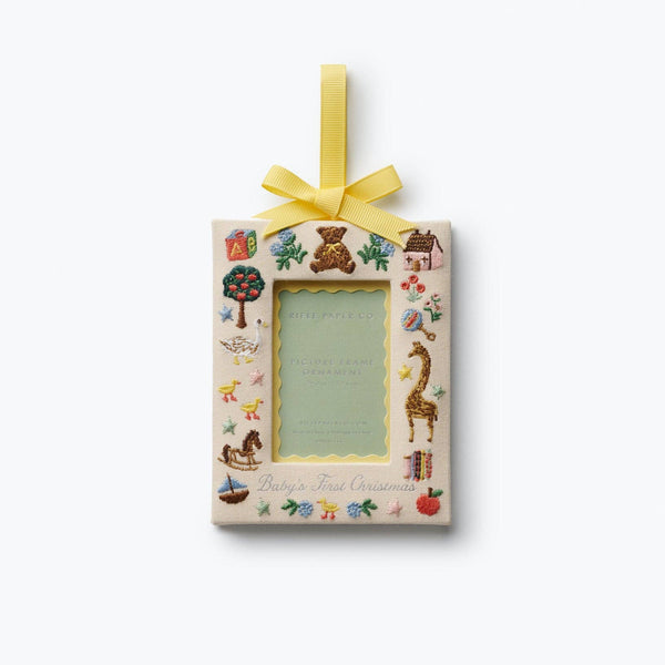 Decorative photo frame with colorful illustrations and a yellow ribbon on a white background