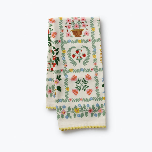 Set of two floral patterned towels on a white background