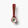 Decorative spoon with floral design on a white background