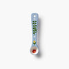 Decorative spoon with floral designs on a white background