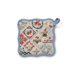 Quilted pot holder with floral and geometric patterns on a white background