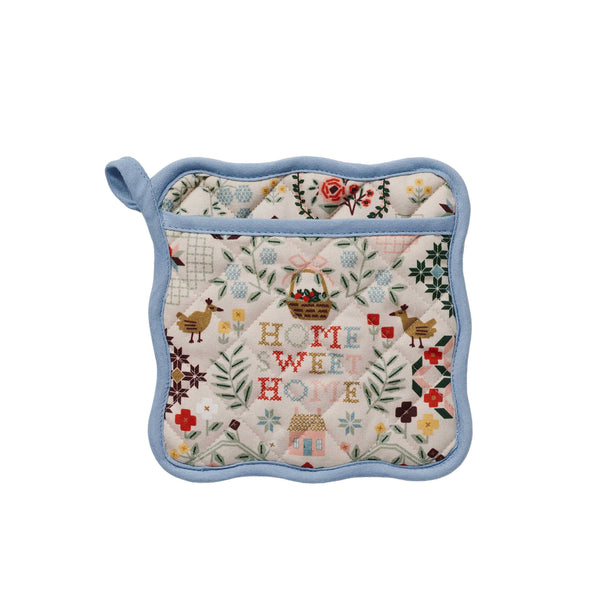 Potholder with 'Home Sweet Home' text and floral patterns on a white background