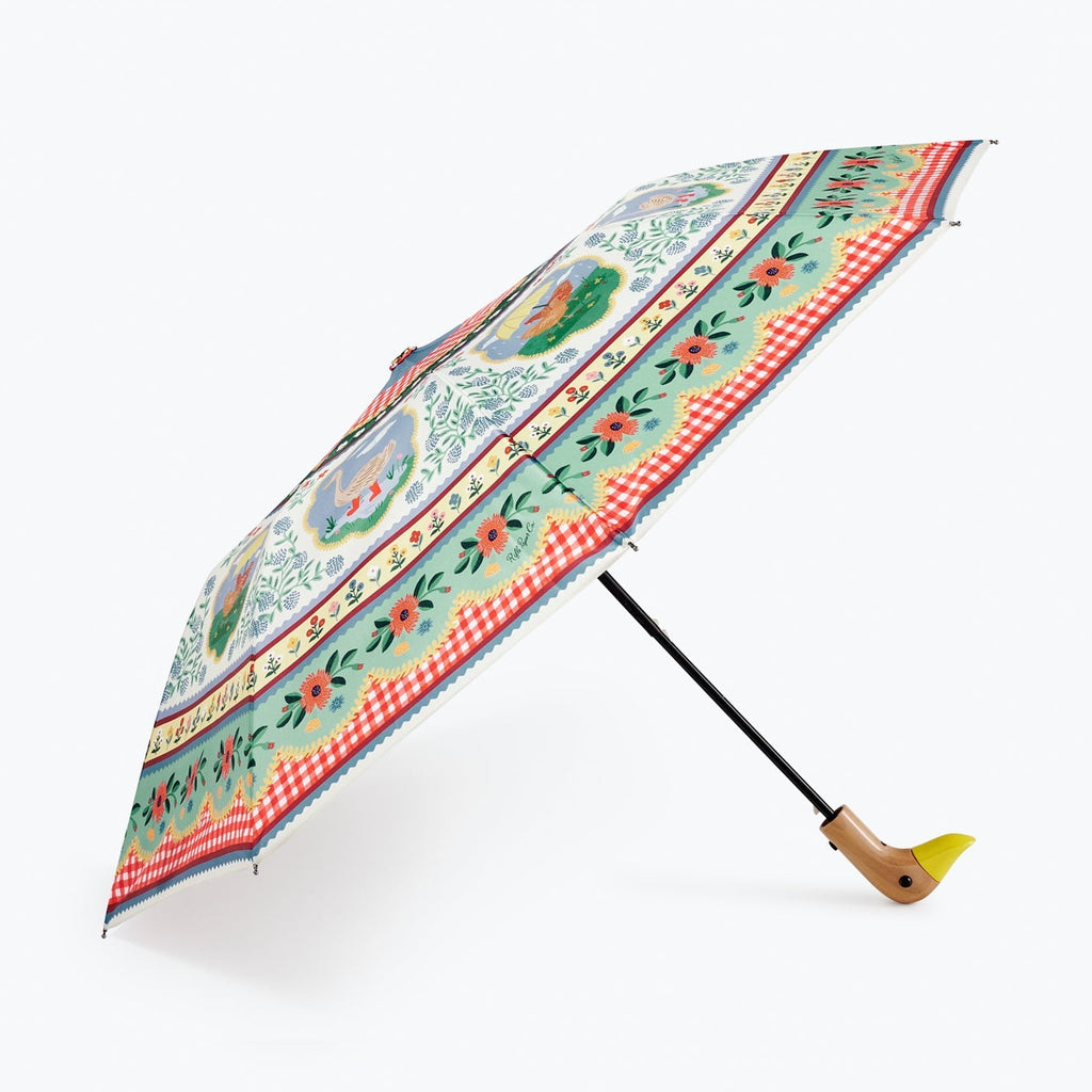 Colorful patterned umbrella on a white background