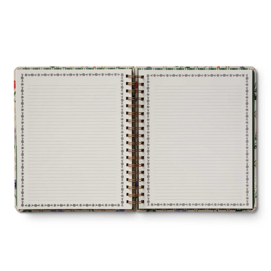 Open notebook with lined pages on a white background