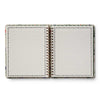 Open notebook with lined pages on a white background