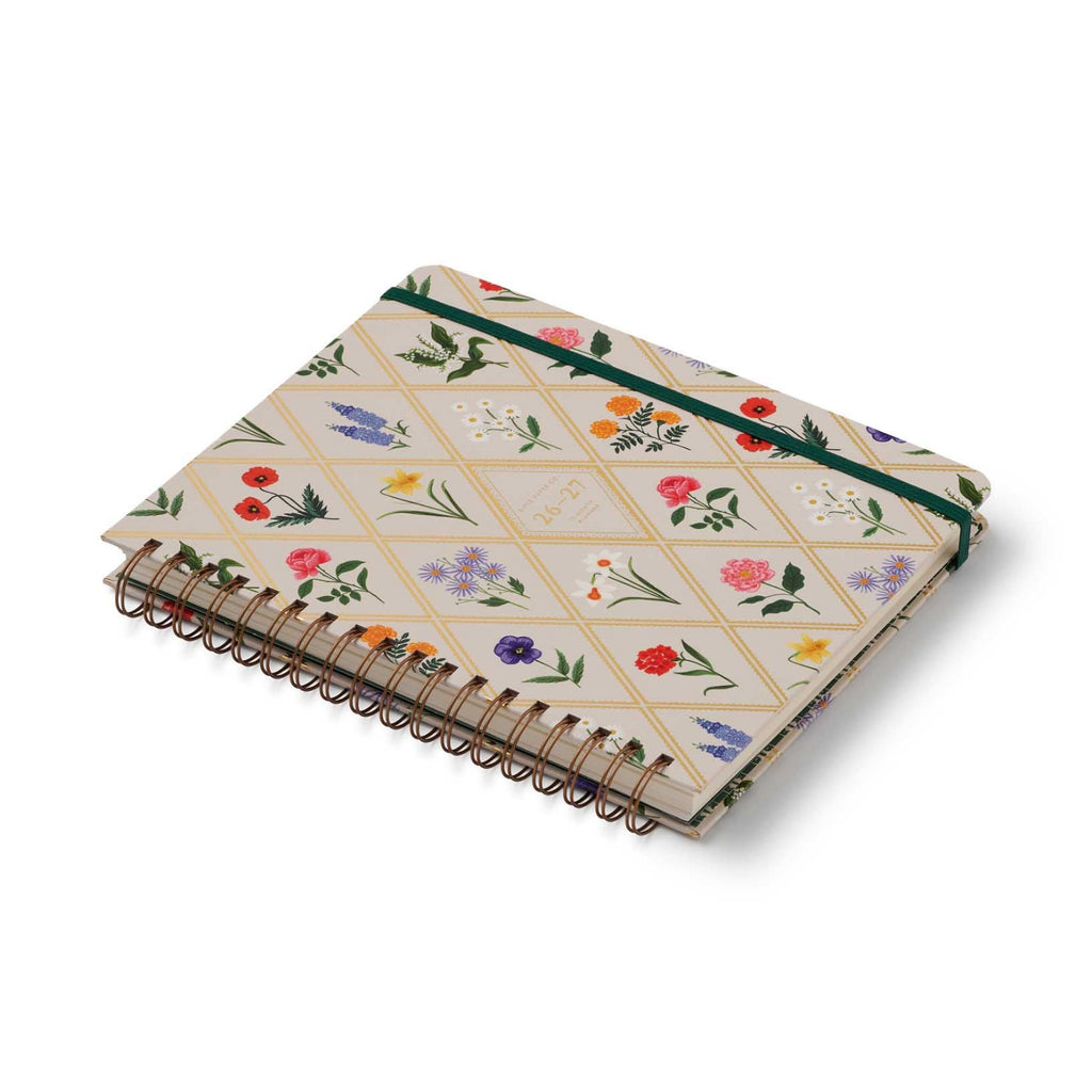 Notebook with floral pattern on a white background