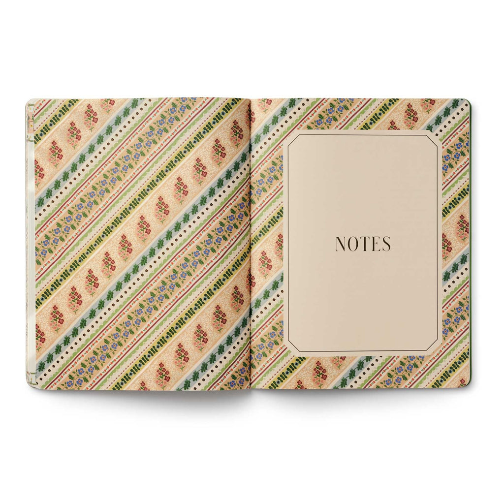 Notebook with decorative cover and 'Notes' label on a white background