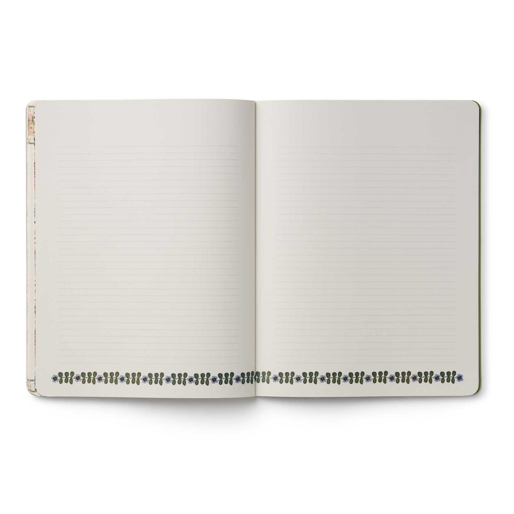 Open notebook with lined pages on a white background
