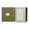 Green planner with a visible brand logo on a white background
