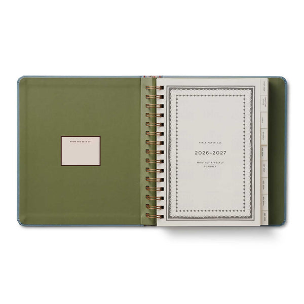 Green planner with a visible brand logo on a white background