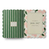 Planner with green striped and floral design on a white background
