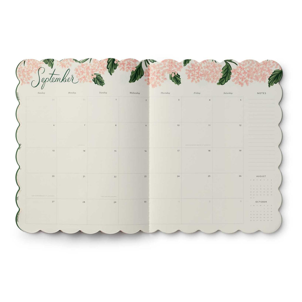 Floral decorated calendar page for September on a white background