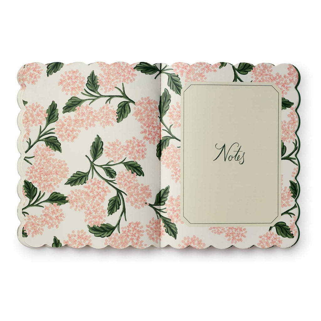 Floral notebook with a 'Notes' page on a white background