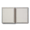 Open notebook with lined pages on a white background